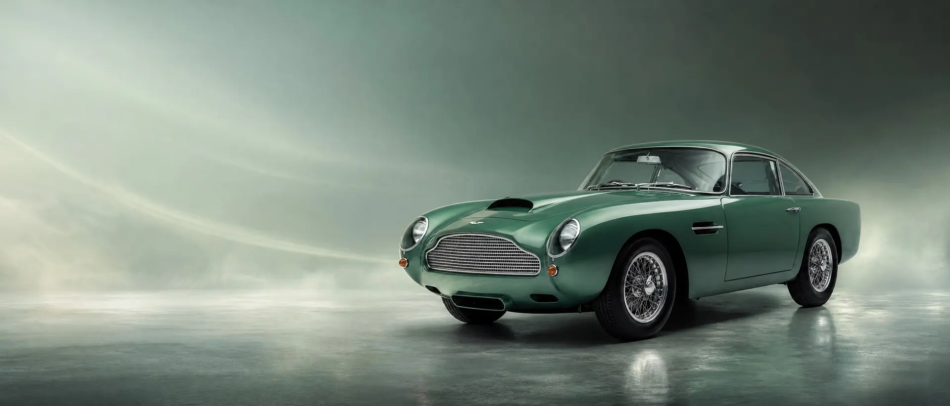 Aston Martin DB4 GT Continuation staged in a darkened scene