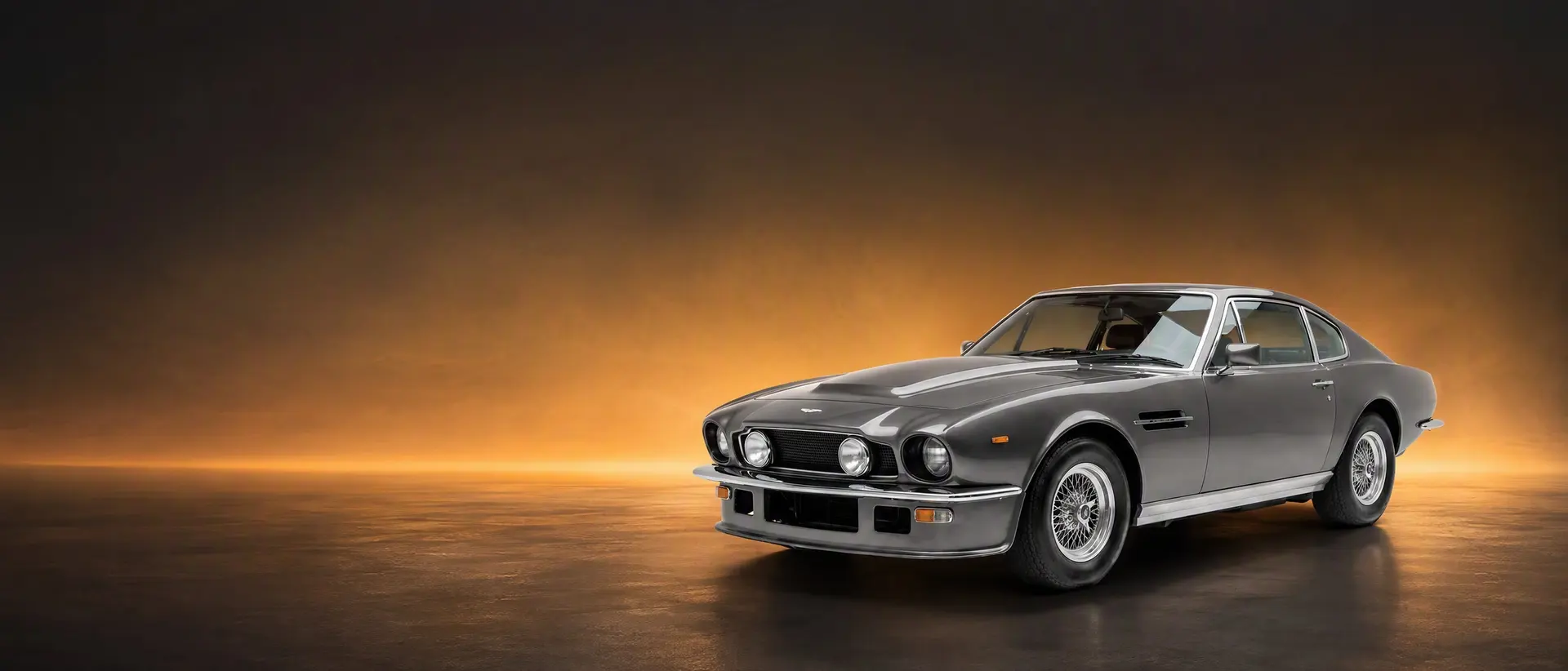 Aston Martin V8 Vantage staged in a darkened scene