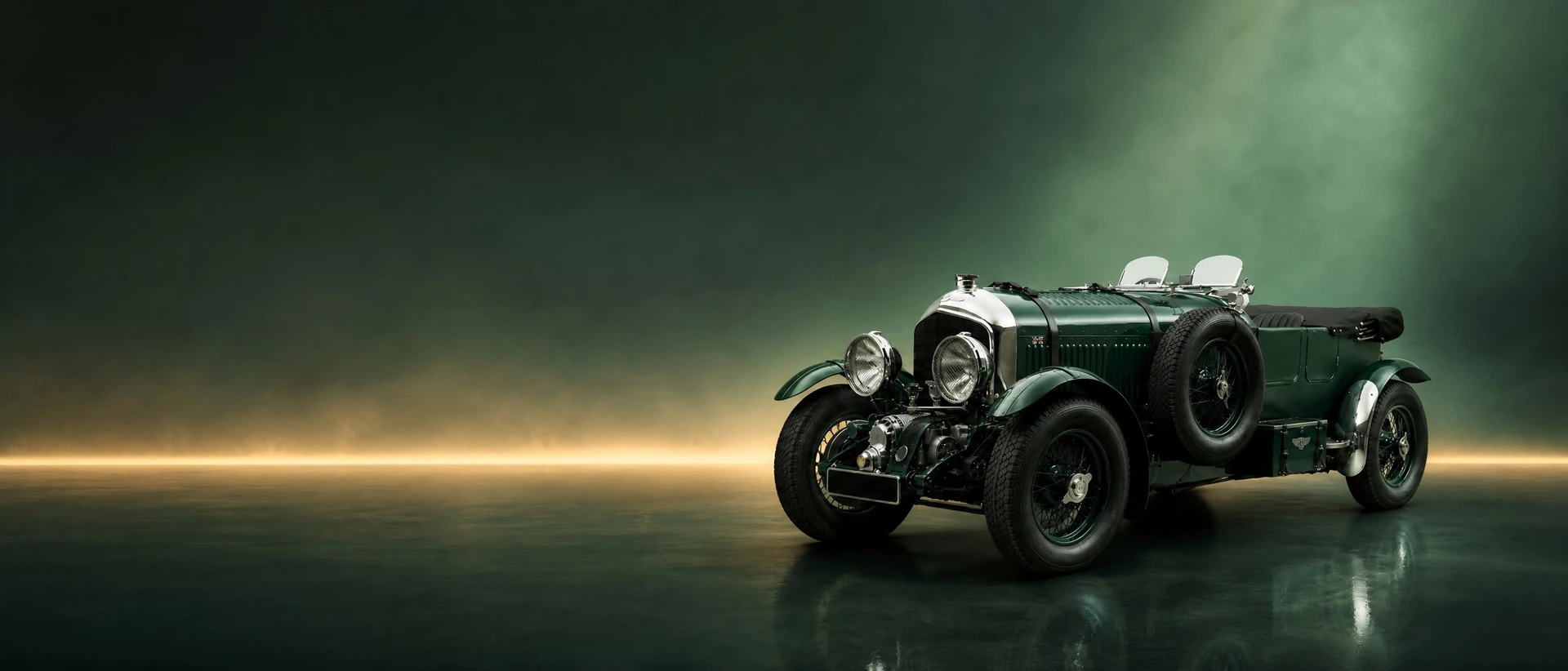 A dark green Bentley 4½ Litre Blower, front three-quarter view on a british-green field with an amber band