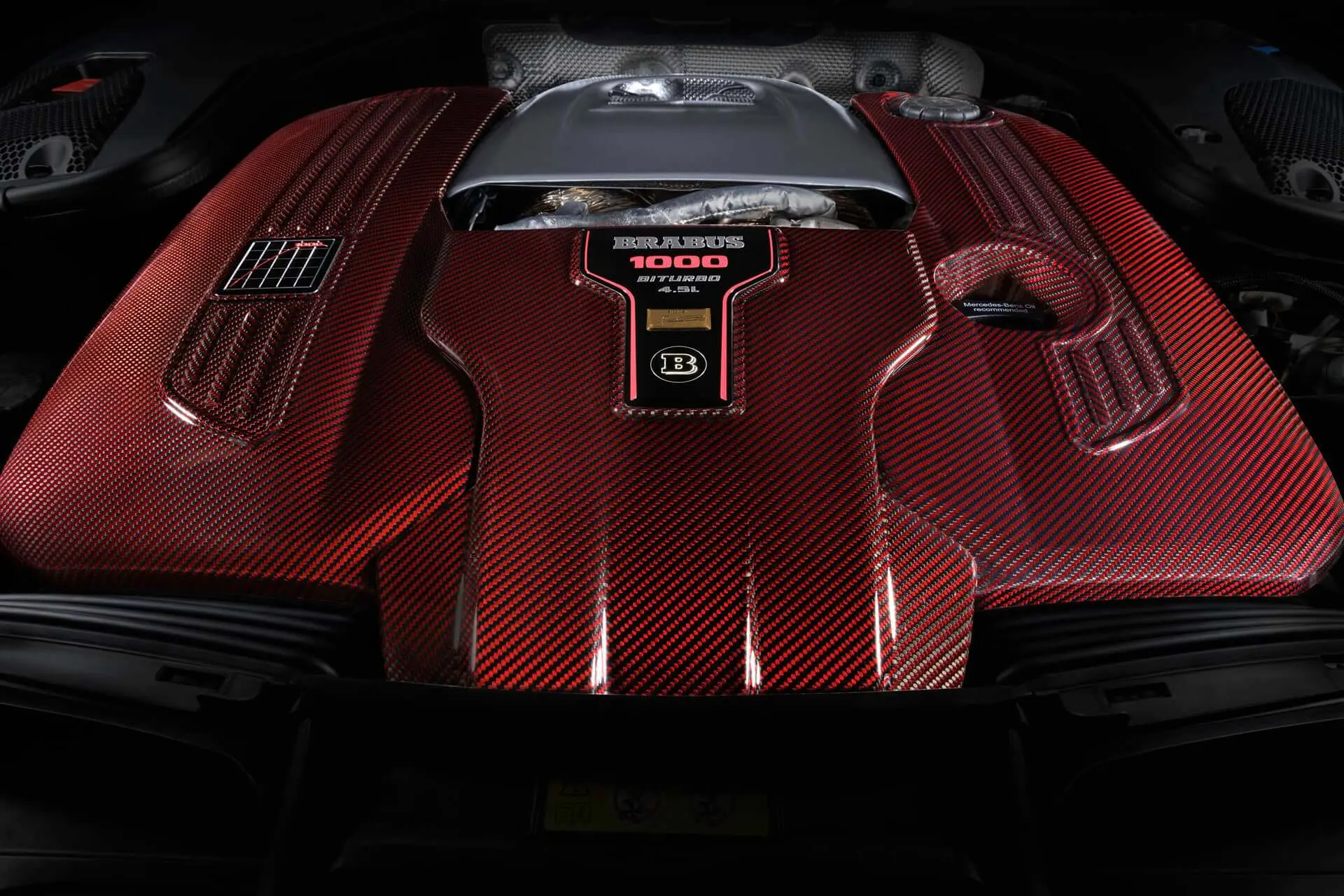 Brabus Rocket 1000 engine bay with red-carbon covers over the 4.5-litre biturbo V8