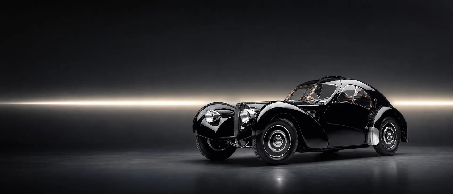 Bugatti Type 57 SC Atlantic staged in a darkened scene