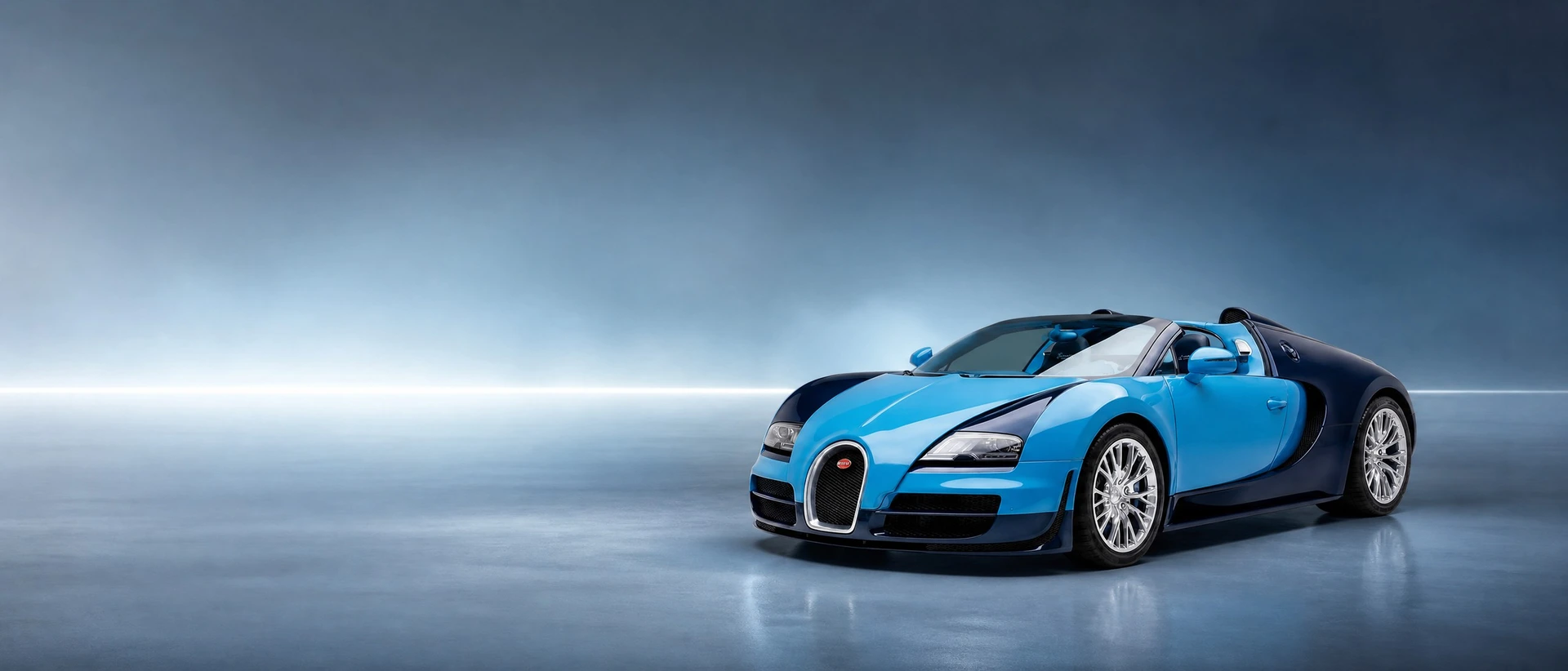 A two-tone blue Bugatti Veyron 16.4, front three-quarter view on a silver-blue field with a horizon light line