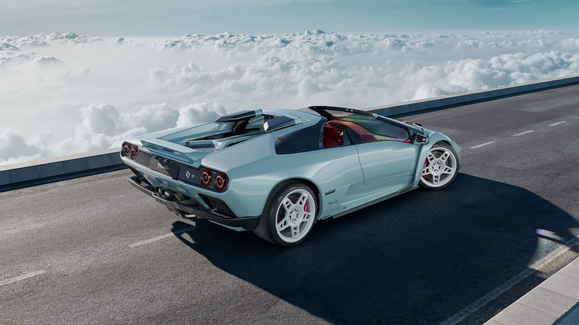 Eccentrica V12 Roadster rear three-quarter view on a mountain road above the clouds