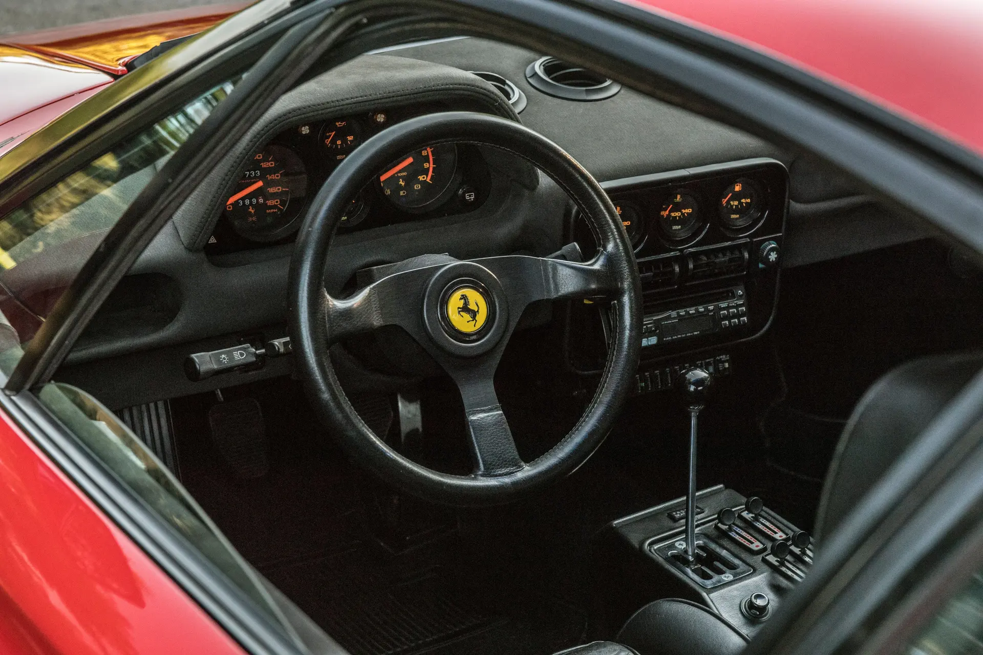 Ferrari 288 GTO dashboard, steering wheel and gated five-speed shifter