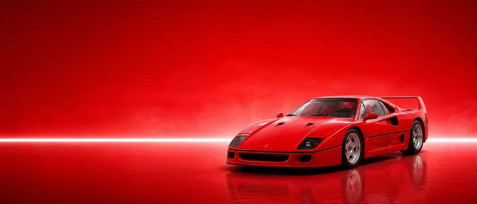 Ferrari F40 staged in a darkened scene