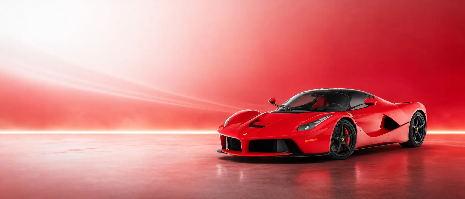 Ferrari LaFerrari staged in a darkened scene
