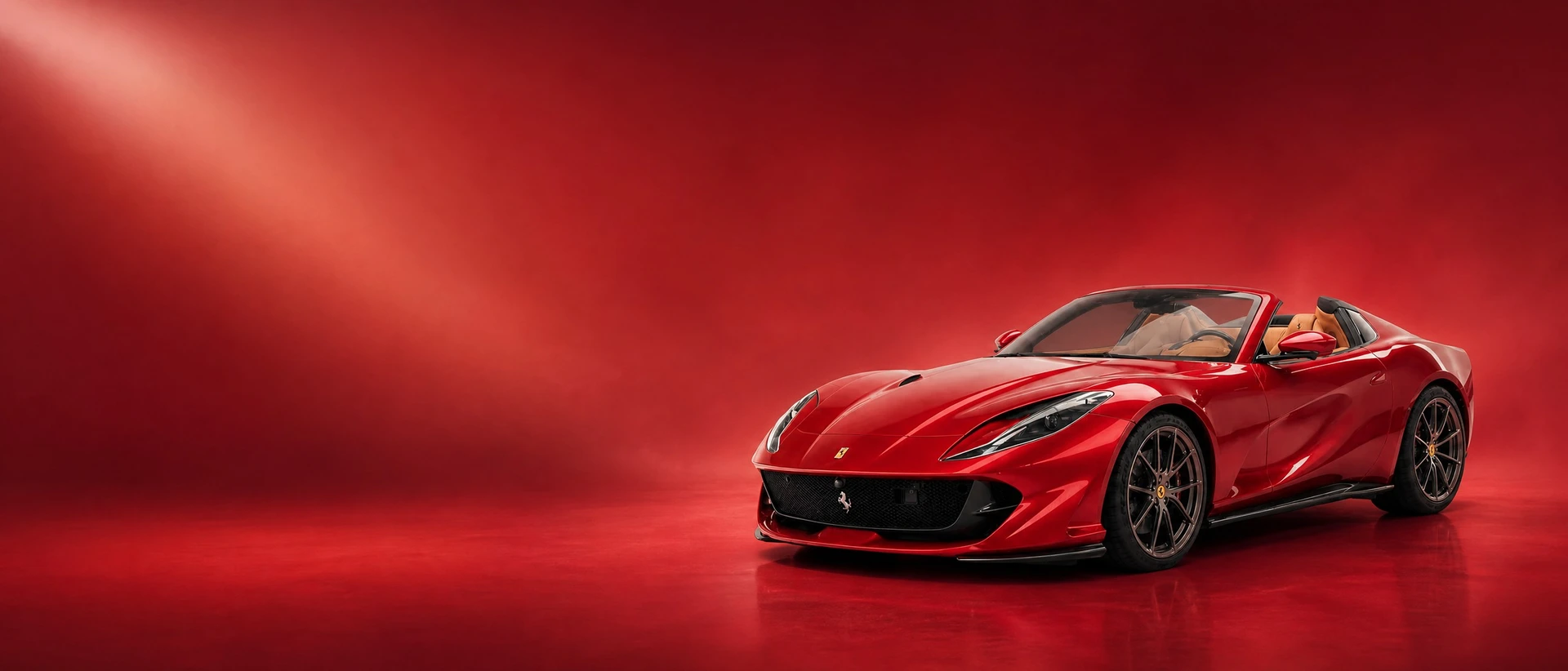 A Rosso Magma Ferrari Omologata, front three-quarter view on a ruby field with a bespoke spotlight