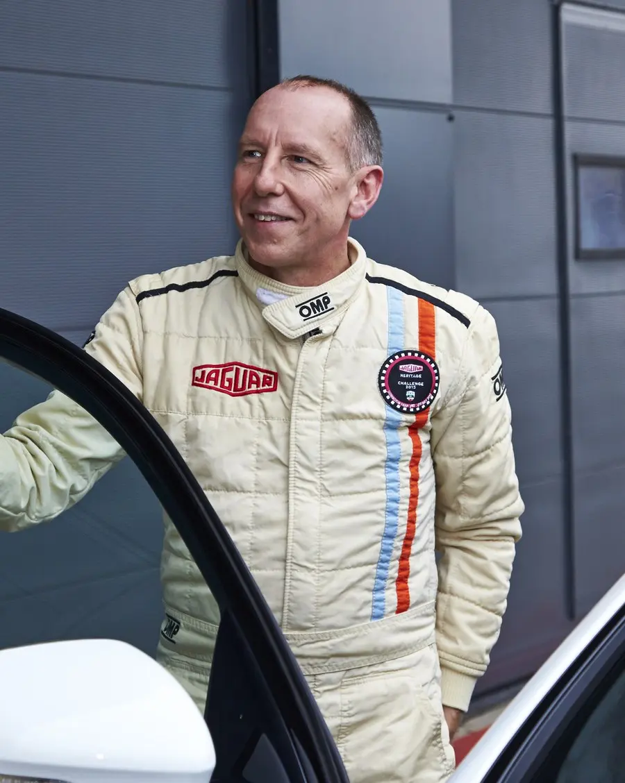 Portrait of Andy Wallace in Jaguar Heritage racing overalls