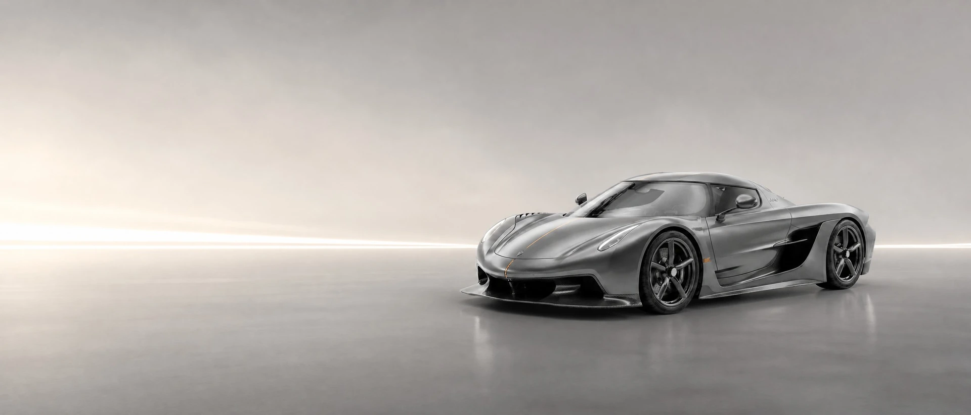 A silver-grey Koenigsegg Jesko Absolut, front three-quarter view on a platinum field with a long streak of light