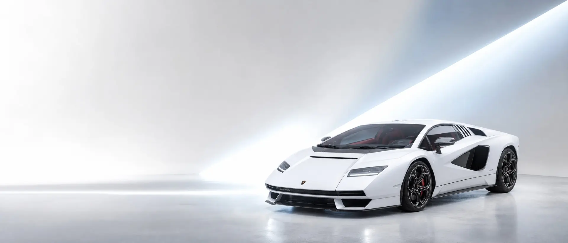 Lamborghini Countach LPI 800-4 staged in a darkened scene