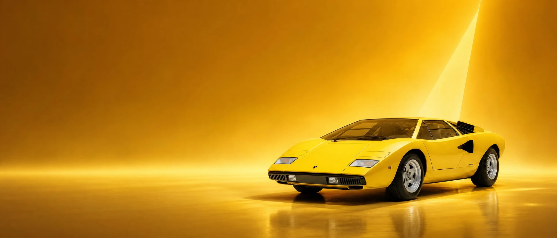 A yellow Lamborghini Countach, front three-quarter view on a gold field with a light wedge