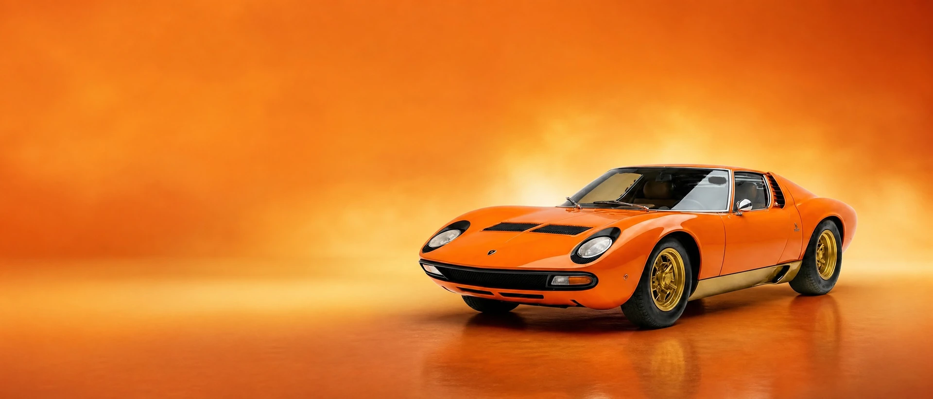 An orange Lamborghini Miura, front three-quarter view on a sunset-orange field with golden haze