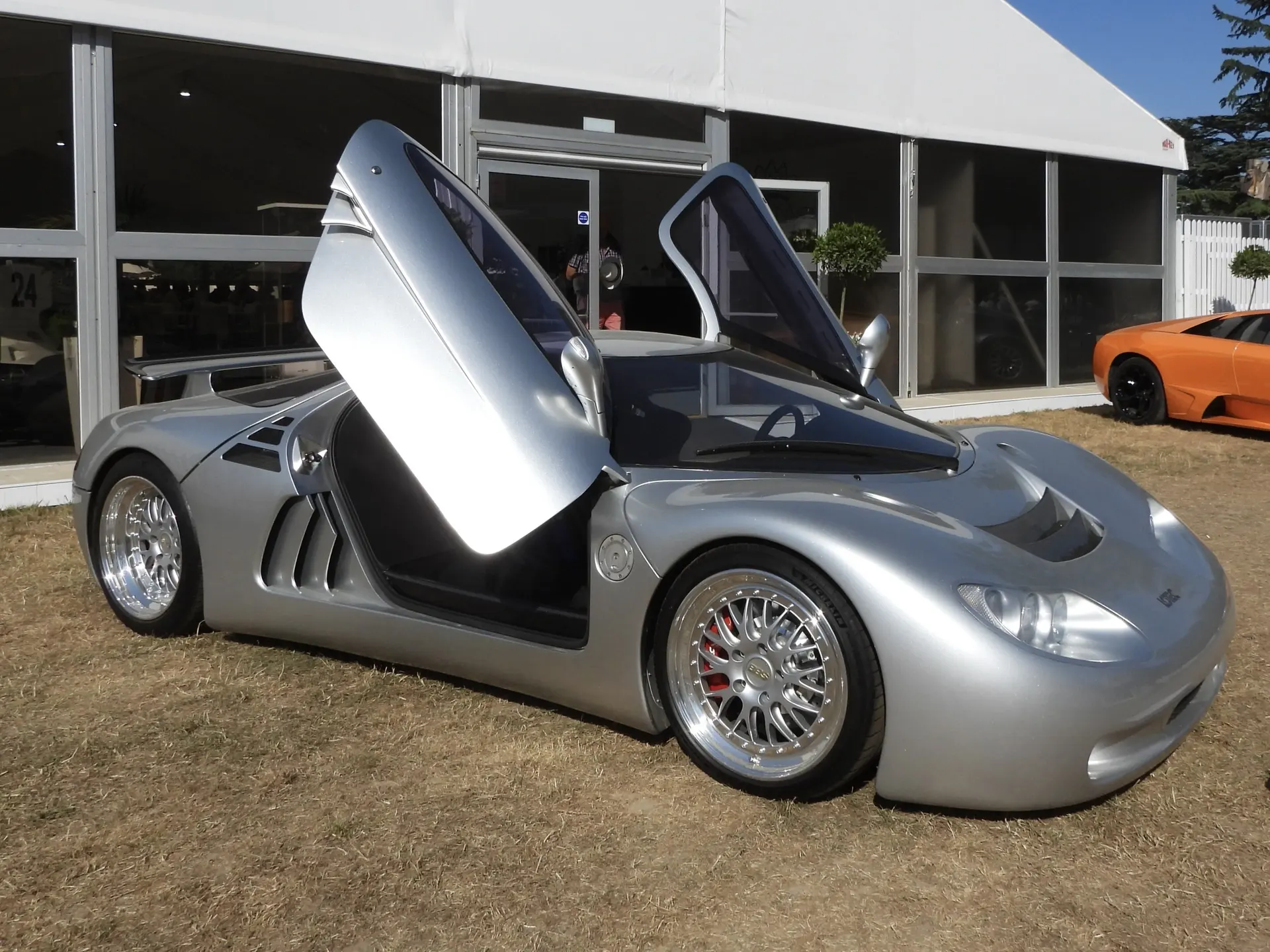 Lotec Sirius with scissor doors open at the Goodwood Festival of Speed, 2026