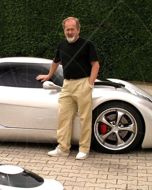 Kurt Lotterschmid standing beside the Lotec Sirius