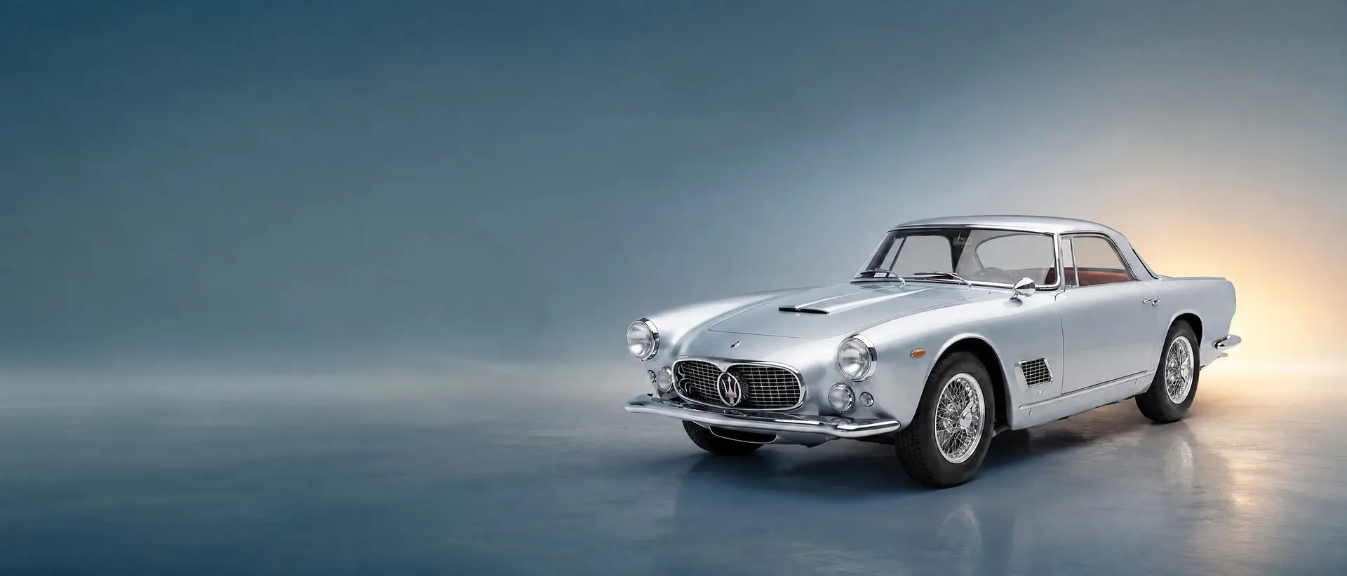 Maserati 3500 GT staged in a darkened scene