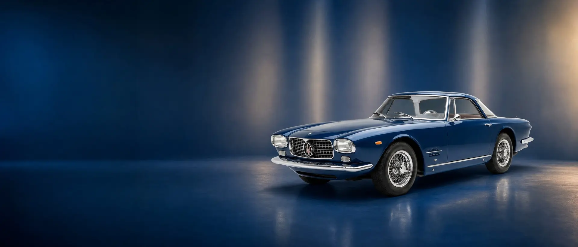 Maserati 5000 GT staged in a darkened scene