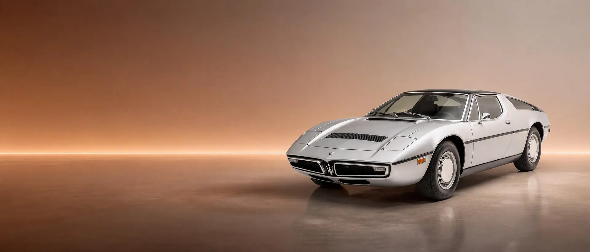 Maserati Bora staged in a darkened scene