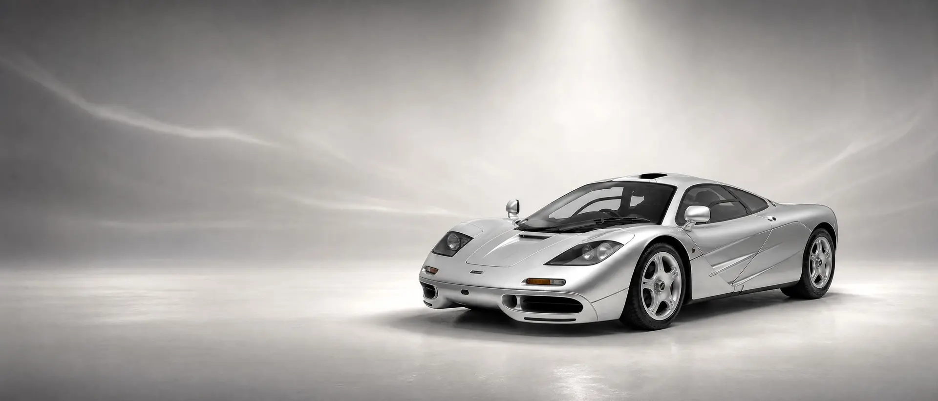 McLaren F1 staged in a darkened scene
