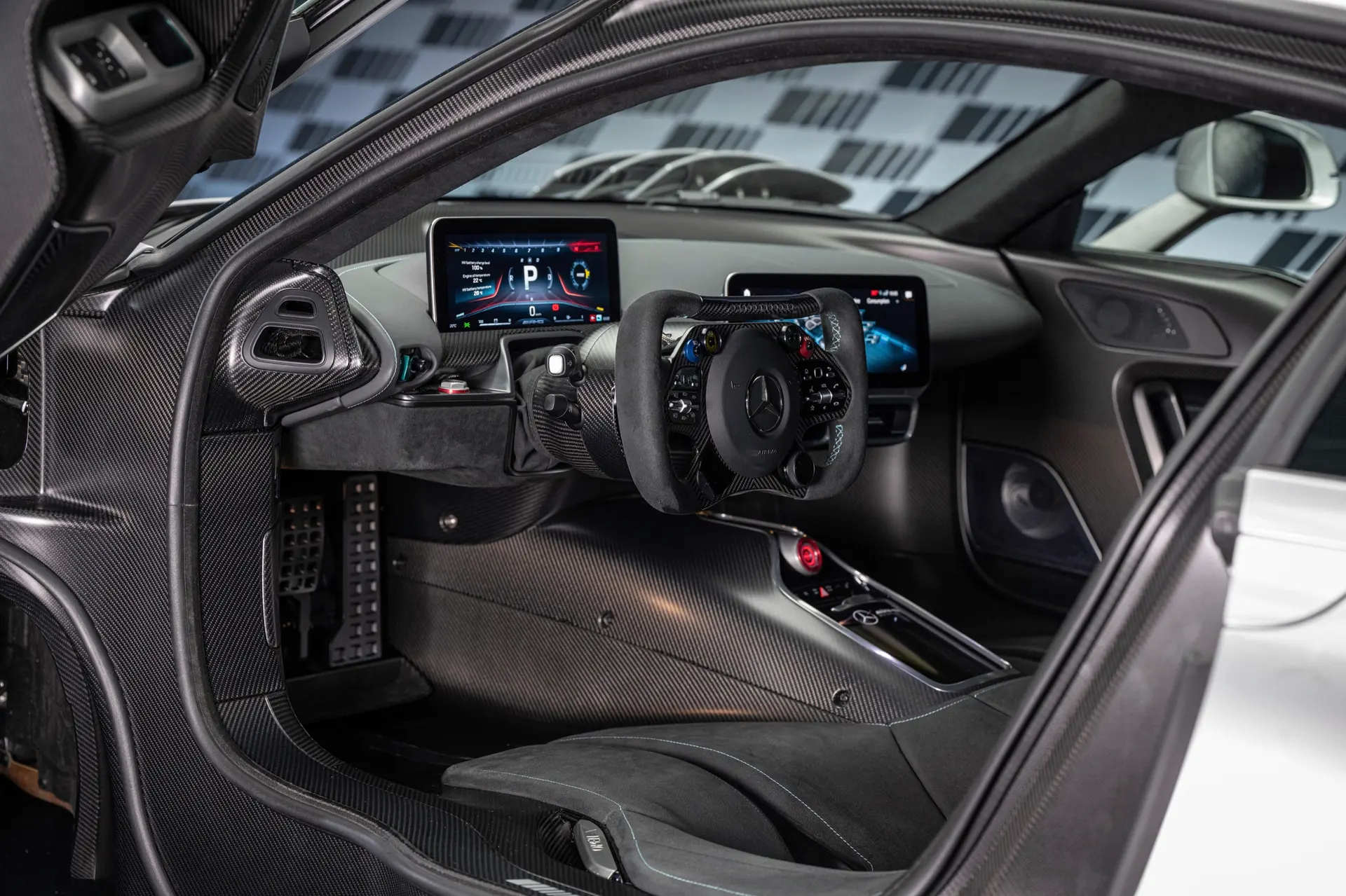 Mercedes-AMG ONE cockpit with fixed bucket seats, steering wheel and twin displays