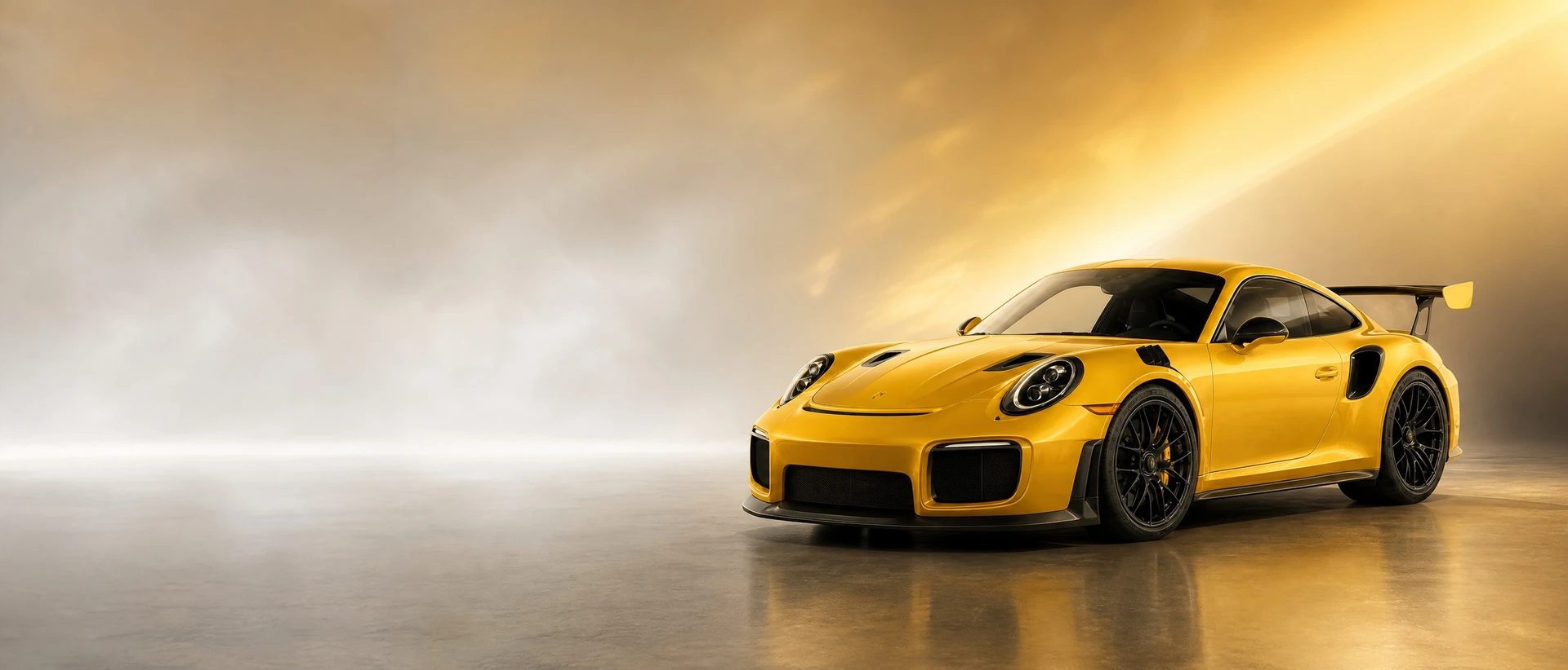 A Golden Yellow Metallic Porsche 991 GT2 RS, front three-quarter view on a silver-gold field with breaking light
