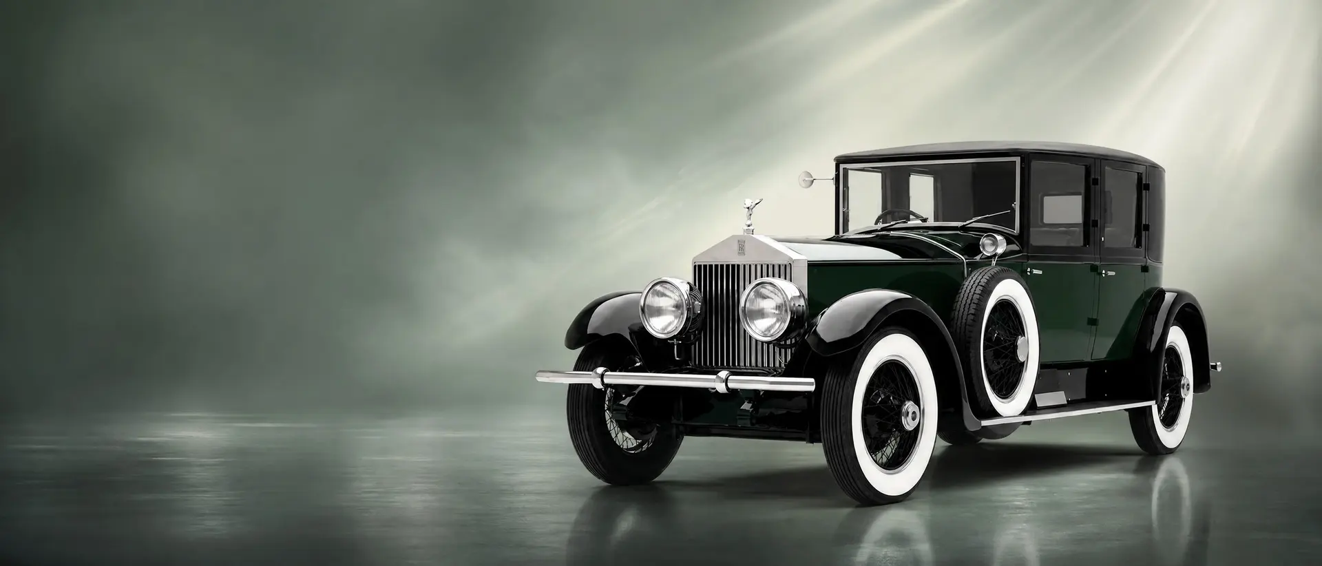 Rolls-Royce Phantom I staged in a darkened scene