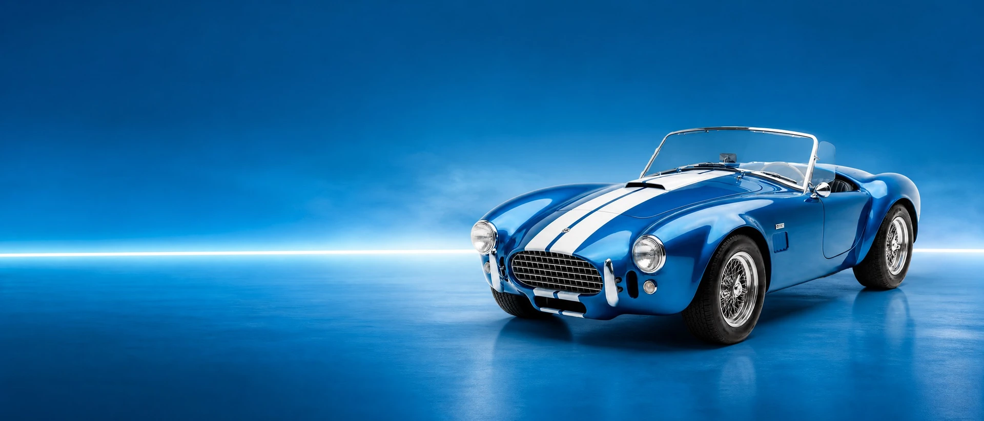A blue Shelby Cobra 289, front three-quarter view on a blue field with a straight light line