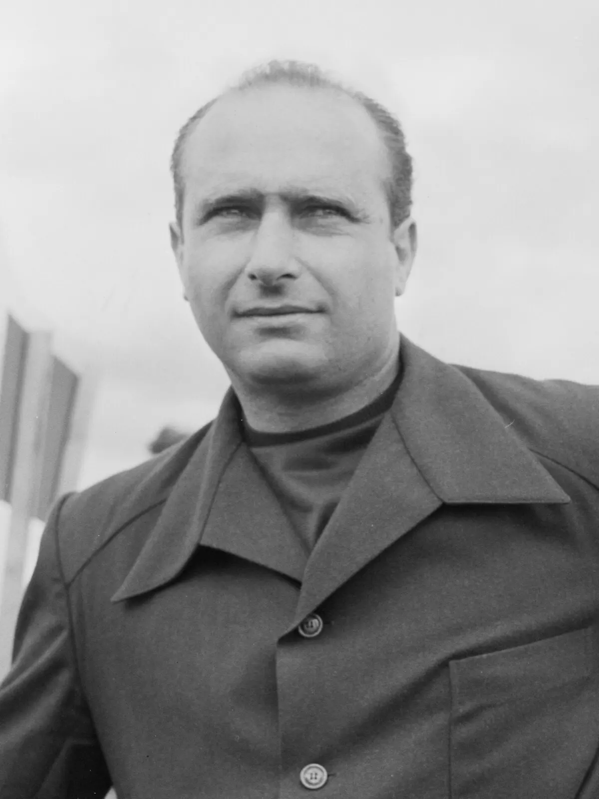 Portrait photograph of Juan Manuel Fangio.